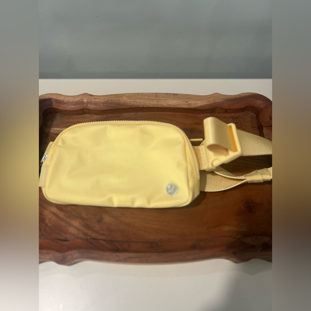 Brand new never used yellow authentic Lulu Lemon crossbody bag